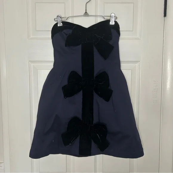 knee length dresses for ladies Windsor Bailey Velvet One-Shoulder Bow Mini Dress in Black | Size: XL main image 1